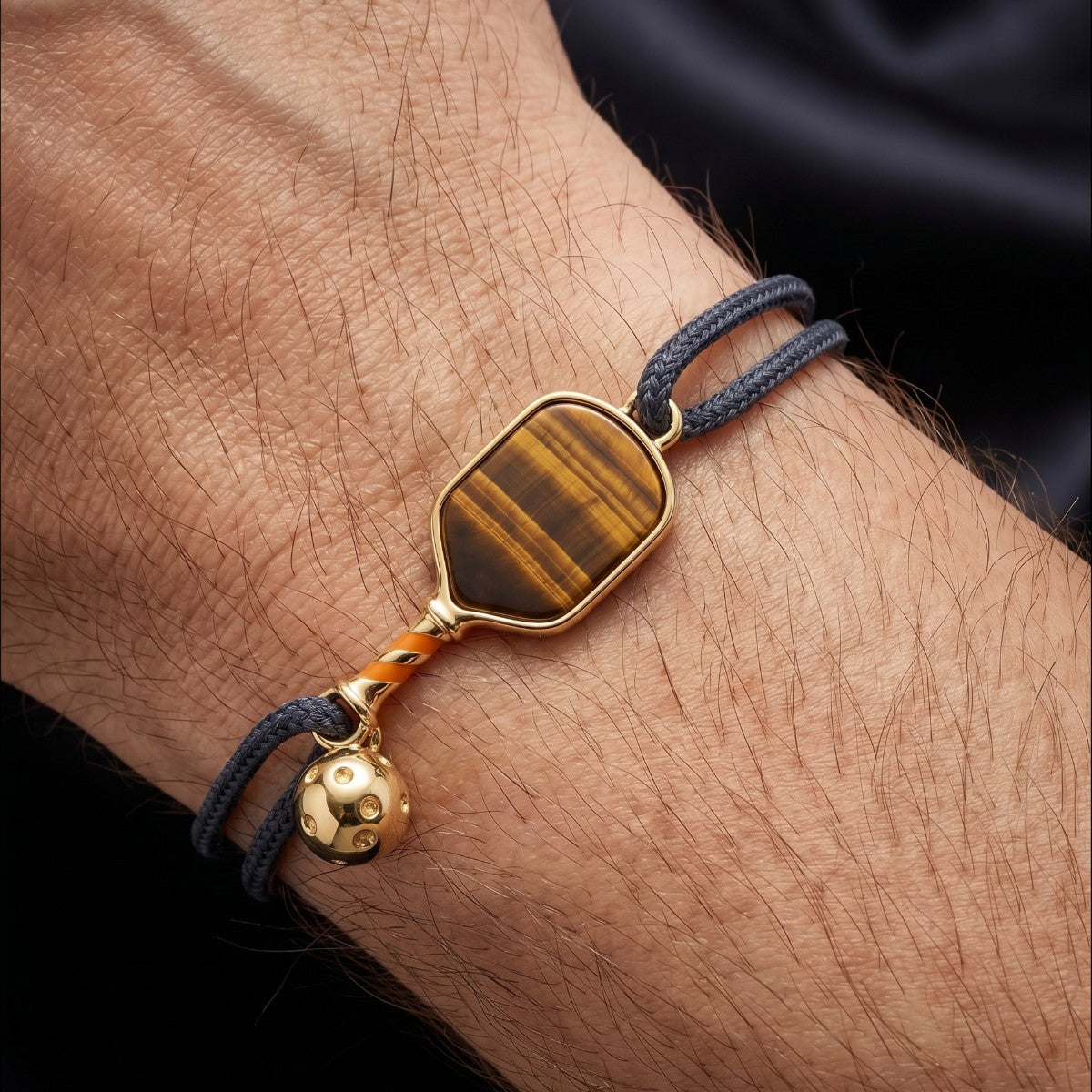 Black pickleball string bracelet with a obsidian pickleball paddle charm