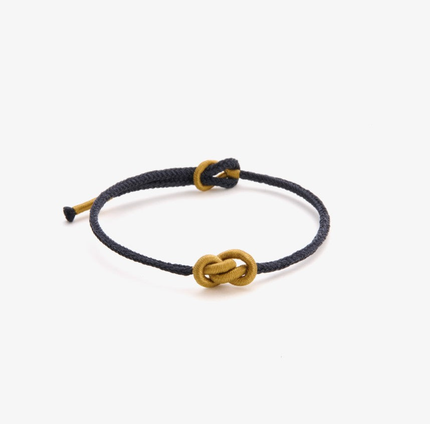 black string bracelet with a yellow yuanbao knot as gift for friends