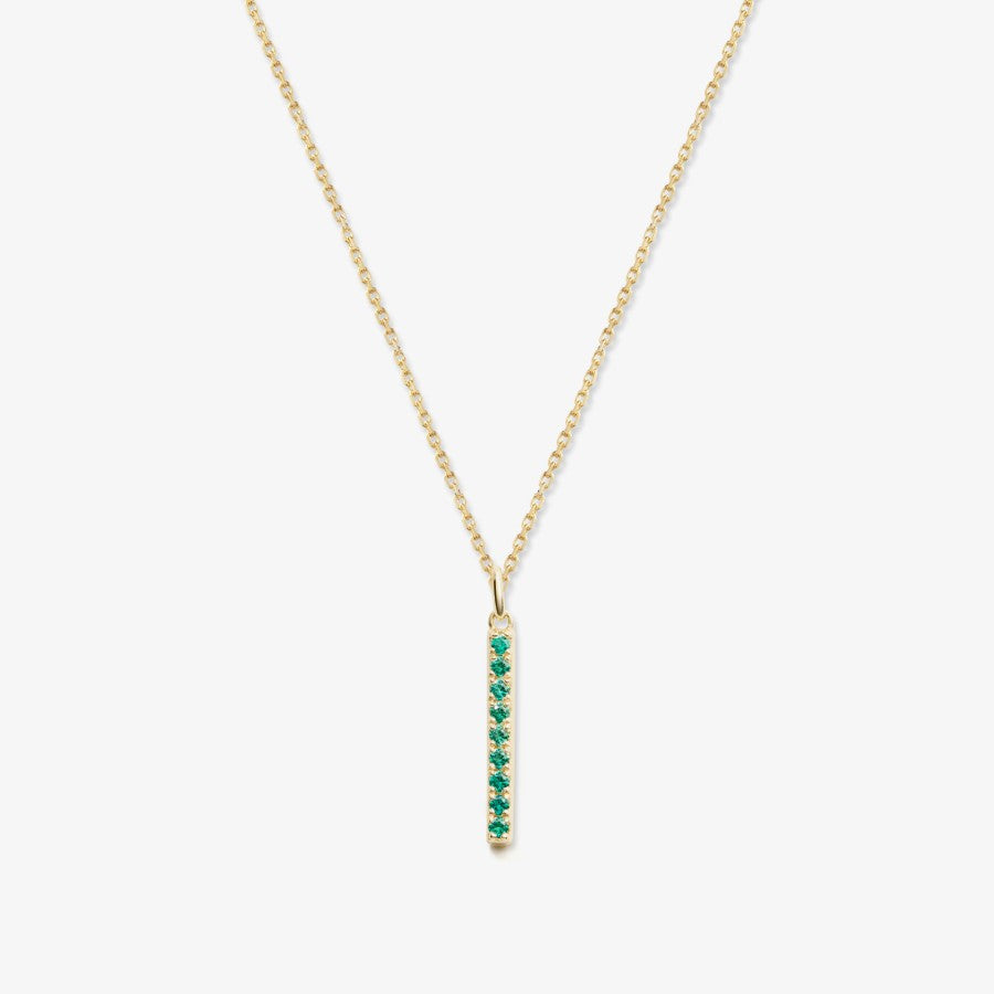 Gold bar necklace with lab-grown emeralds