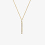 Gold bar necklace with white sapphires