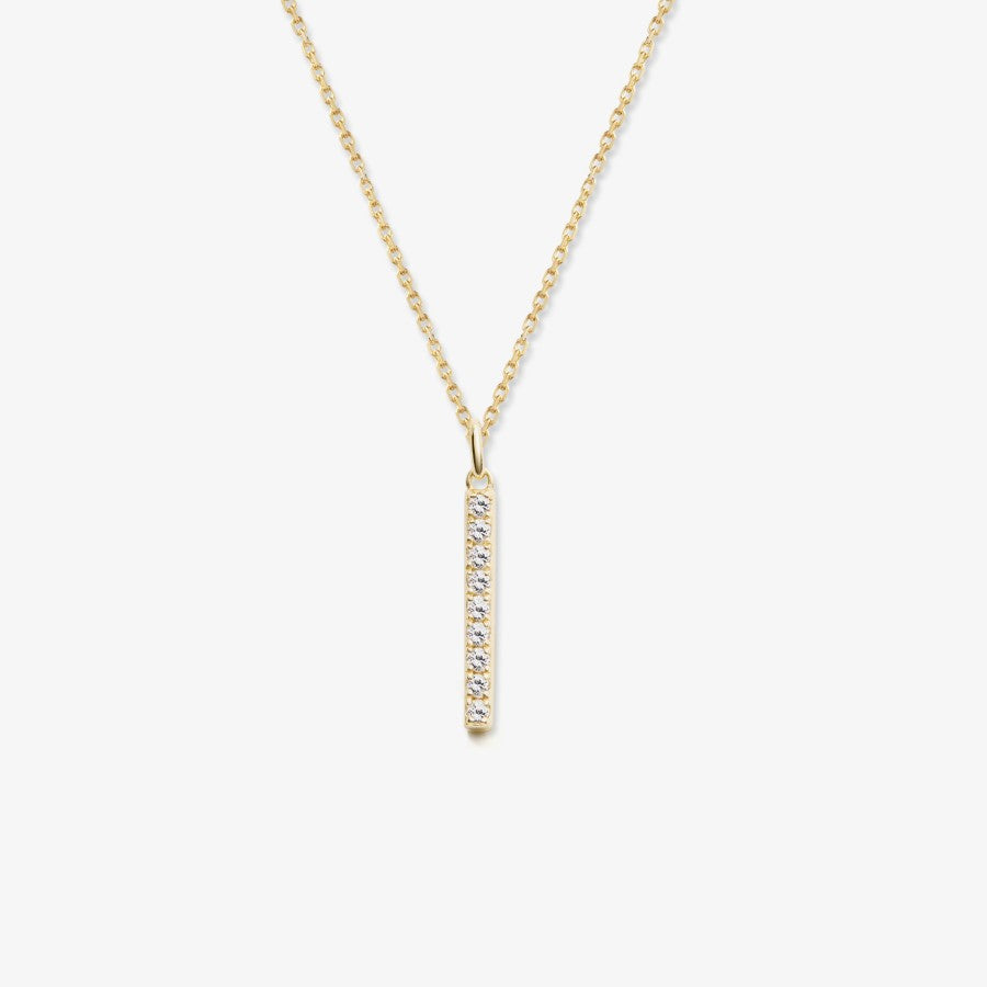 Gold bar necklace with white sapphires