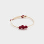 white string bracelet with a red ruyi knot