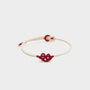 white string bracelet with a red wukong knot