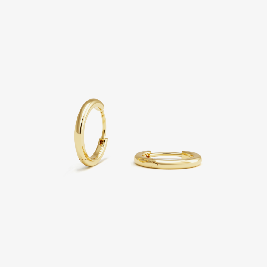 A pair of medium gold hoop earrings